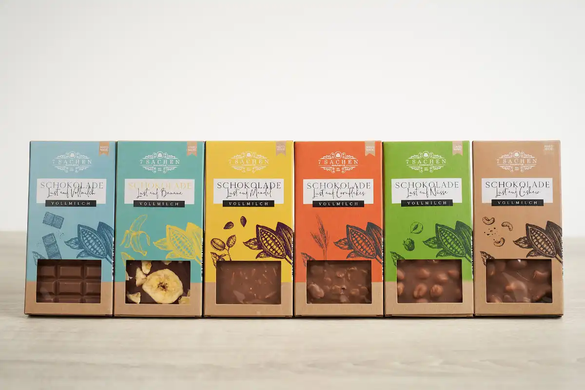 Handgemachte Vollmilch-Schokoladentafeln mit Banane, Nüssen, Cashew und Cornflakes – 7 Sachen Manufaktur
